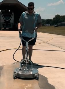Pressure washing a concrete driveway in Jacksonville FL — Victory Washing